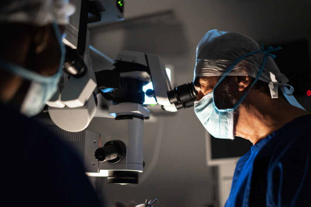 Ophthalmologist during eye surgery